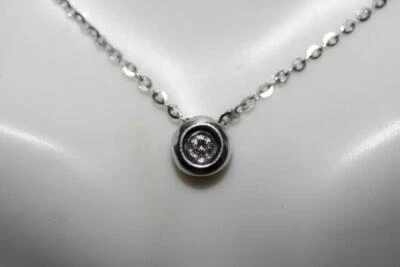 Colgante Phillipe Charriol 18KWG bisel donut diamante 0,07ct en cadena Rolo 14K 16" Foto 1 de 4