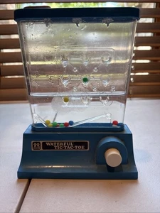 De colección 1977 TOMY Maravilloso Agua Agua Tic-Tac-Toe FUNCIONA, Sostiene Agua - Imagen 1 de 8