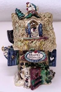 BLUE SKY CLAYWORKS Cottage di Natale cottage - Foto 1 di 18