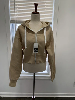 Conjunto de pantalón pequeño y sudadera con capucha beige con bolsillo La Bijou Foto 1 de 4