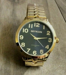 Miykon Men's Watch Round Black Dial Arabic Number Hours on Gold Stretch Band New - Picture 1 of 2