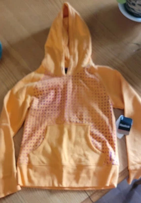 NUEVO CON ETIQUETAS Sudadera Juvenil Talla Pequeña Reebok Naranja con Lunares Púrpura, Rojo y Rosa Foto 1 de 3