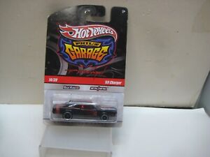 HOT WHEELS 2010 LARRY'S GARAGE SERES CHASE 1969 DODGE CHARGER MINT ON CARD *