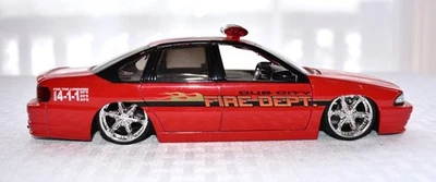 Chevrolet Chevy Impala 1996 departamento de bomberos 1:24 auto Jada Dub City Heat Foto 1 de 4