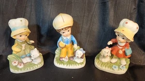 3er Set Junge mit Welpe, Mädchen mit Welpe, Mädchen mit Kätzchen Figuren - Bild 1 von 9