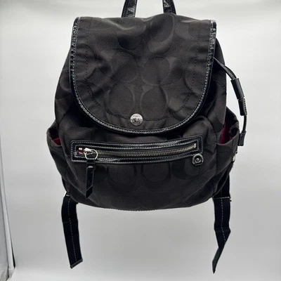 Mochila Coach F16548 Signature negra de nailon con cordón solapa bolsa de forro rosa Foto 1 de 4