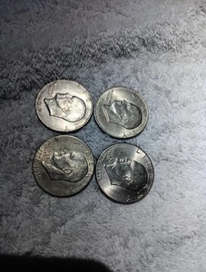 1971,72and 2 ,76. One Dollar Coins 4 In Total Uncirculated - Picture 1 of 4