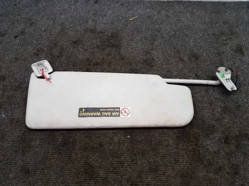 Parasol izquierdo para conductores Volkswagen Jetta 2007-10 sin abridor de garaje *gris*  Foto 1 de 4