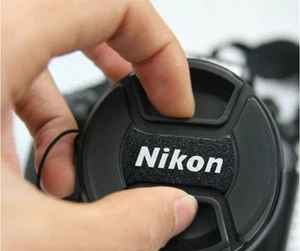 Nikon 58mm Lens Cap with Cord - Picture 1 of 1