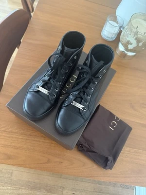 Zapatillas deportivas Gucci de cuero con top alto para mujer Foto 1 de 4