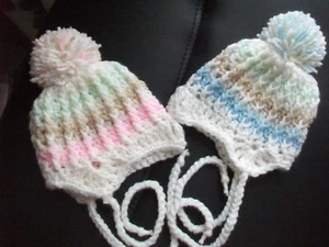 2 X HANDCROCHETED BOBBLE HATS WITH EAR FLAPS/TIES..TO FIT 0-3 MONTHS - Picture 1 of 4