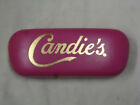 Candie's hot pink hard eyeglass case with logo in gold tone
