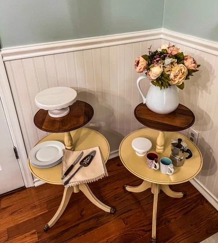 Antique 1 pair matching dumbwaiter tables. Refinished in a two tone fashion Cover