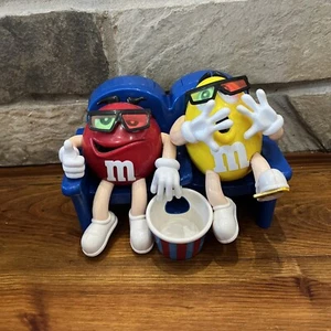 Red & Yellow M&M's Candy Dispenser Sitting On Blue Couch Press Leg For Candy - Picture 1 of 19