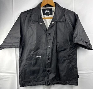 Chaqueta cortavientos Stussy Coaches manga corta mediana negra unisex? - Imagen 1 de 11