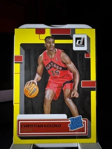 2022-23 Donruss Christian Koloko Rookie #233 Yellow Flood RC  Raptors - Picture 1 of 2