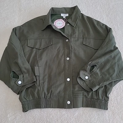 Abrigo ligero Umgee verde manga corta abotonable para mujer M nuevo con etiquetas Foto 1 de 4