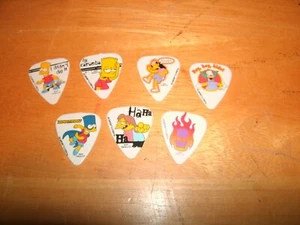 7 Simpsons guitar picks Grover Allman Australia medium 2004 new old stock - Picture 1 of 2