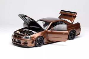 MotorHelix Nissan Skyline GT-R R34 CUSTOM VERSION Diecast Modellauto Kupfer - Bild 1 von 15