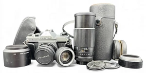 Asahi Pentax K-1000 fotocamera pellicola con obiettivo Takumar 1:4/200 e accessori NON TESTATA - Foto 1 di 22