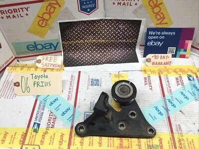 04-09 POLEA TENSORA TOYOTA PRIUS con soporte de montaje # 12315-21051 OEM Foto 1 de 4