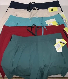 Pantalones Cortos Tejidos Elásticos Para Hombre 7" Athetic Todo en Movimiento TURQ/AZUL MARINO/VERDE AZULADO/ROJO/NEGRO - Imagen 1 de 17