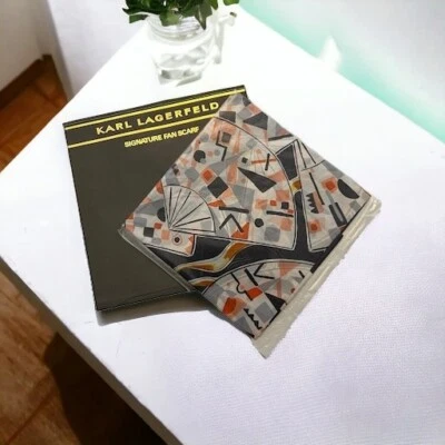 Bufanda de seda NOS de Karl Lagerfeld. Embalaje original sin abrir. 100% seda. 32" Foto 1 de 4
