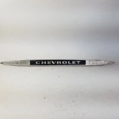 Chevy Bel Air 1959 y El Camino tablero guantera Chevrolet emblema moldura OEM Foto 1 de 4