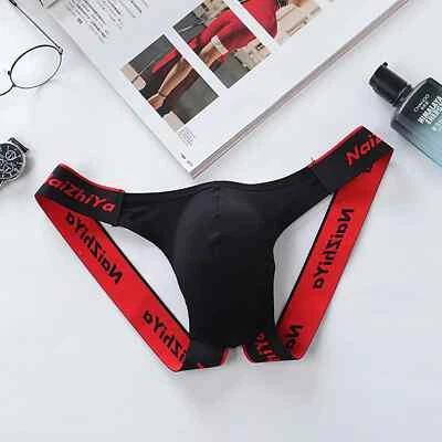 Sexy Tanga de tirantes para hombre tiro bajo Tanga T/G Espalda abierta Poliéster Ropa interior Foto 1 de 4
