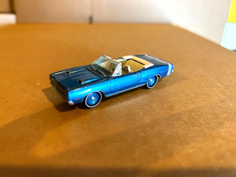 Johnny Lightning  1967 Dodge Chaparal Convertible "Blue w/White Interior 1:64 - Image 1 of 1