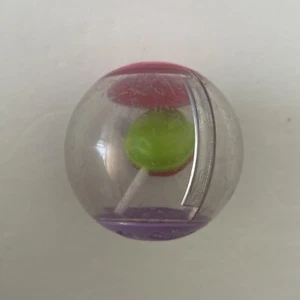 Comida de caramelo Fisher Price Roll Arounds Peek Ball Lollipop - Imagen 1 de 1