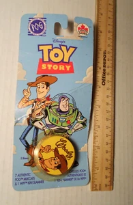 Disney Toy Story Woody Pixar 1995 Pog 1995 Federación de Canadá 7 pogs y slammer - Imagen 1 de 5