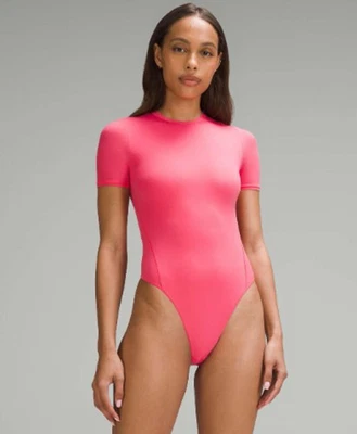 NUEVO CON ETIQUETAS Lululemon Ultra Suave Nulu Manga Corta Crew Tanga Body Esmalte Rosa Talla M Foto 1 de 4