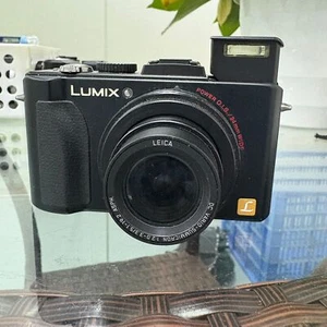 Panasonic Lumix DMC-LX5 10.1MP 3.8x Optical Zoom Digital Camera English language - Picture 1 of 8