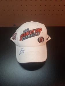 NIKE HOCKEY REGELN UMKLEIDERAUM PRODUKT 2003 STANLEY CUP CHAMPIONS NJ DEVILS AUTO - Bild 1 von 5