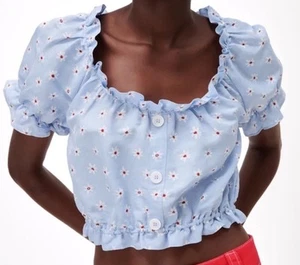 Top corto Zara pequeño azul claro margarita con volantes mangas cortas decoración botón - Imagen 1 de 6