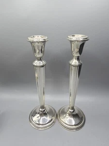 Paire de bougeoirs anciens Empire argent massif lesté art déco 9,75" - Photo 1/20