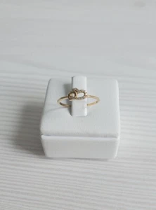 750 18k Gelbgold Ring Band schlicht zierlich gedreht verschränkte Herzen CZ Gr.7,25 - Bild 1 von 7