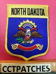 NORTH DAKOTA STATE FLAG SHIELD SOUVENIR PATCH - Picture 1 of 2
