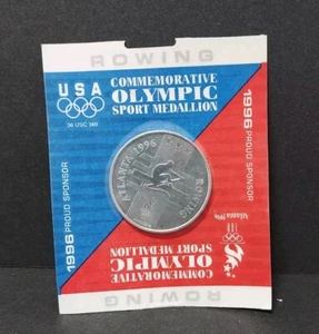 Olympic Medallion 1996 Atlanta Rowing General Mills Promo Sealed in Cello pack - Bild 1 von 2