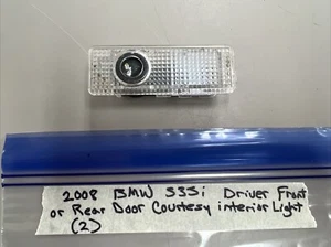LUZ INTERIOR CORTESÍA PUERTA DELANTERA O TRASERA BMW OEM 745 750 760 545 550 645 M5 - Imagen 1 de 2
