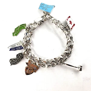 Vintage Sterling Silver 7 Charms Bracelet 7.5" Assorted Travel USA Canada Jersey - Picture 1 of 6
