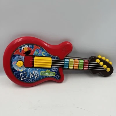 Guitarra Hasbro Plaza Sésamo Elmo Lets Rock 2010 Juguete Niño Instrumento de Música Rojo Foto 1 de 4