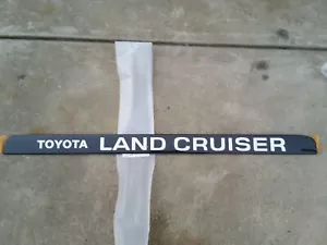 Toyota 80 series Land Cruiser tail gate rear badge NEW 75435-60040 - Picture 1 of 1