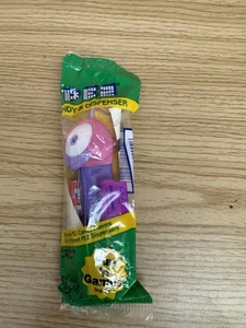 PEZ Alien Space Bug Süßigkeitenspender lila Stiel rosa Kopf weiß/lila Gesicht  - Bild 1 von 3