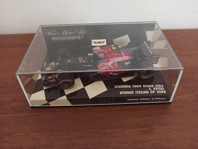 F1 MINICHAMPS 1/43 SCUDERIA TORO ROSSO STR3 S. VETTEL WINNER ITALIAN GP 2008 - Immagine 1 di 2