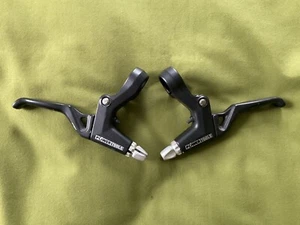 Coppia Leve Freno Bici Powertools 2 Dita Tiraggio Lineare Nero BELLE MTB Hybrid - Foto 1 di 2