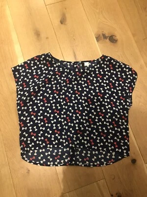 H&M Blue Short Sleeve Top With Red And White Bow Pattern Size 10 - Image 1 of 3