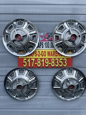 1966 Ford Fairlane  4 bar Spinner Ratrod Hubcaps Deluxe Beautiful 14” V-8 set 4 - Image 1 of 4