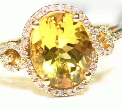 Anillo de compromiso vintage de diamantes con halo de esmeralda amarilla natural de oro de 3,23 quilates de 14 quilates Foto 1 de 4